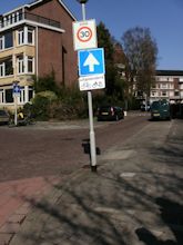 Road sign in Rotterdam warning motorists of counterflow cycle traffic